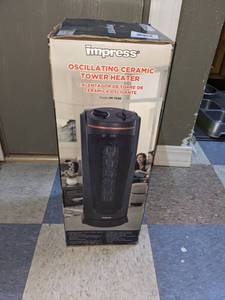 lot 48 image: Impress Oscillating Ceramic Tower Heater