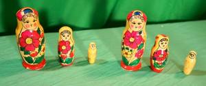 lot 57 image: Two Russian Matryoshka Hand Painted Nesting Dolls