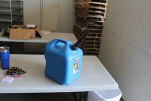 lot 217 image: Midwest Can Quick Flow Spout Plastic Kerosene Can 5 Gallon 7600