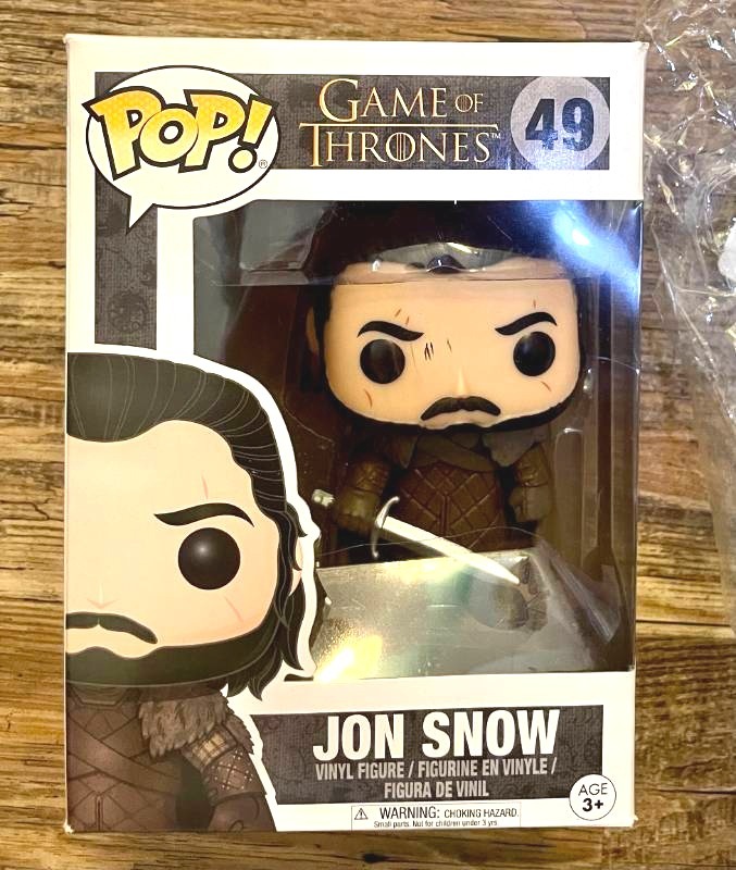 lot 67 image: Game of Thrones Jon Snow Funko Pop and Ghost Wirewolf Plush