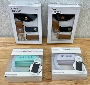 lot 16 image: Lot of Cell Phone Selfie Lights and Cable Organizers