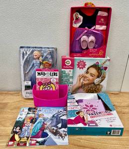 lot 26 image: Lot of Various Toys Frozen Doll Clothes Crafts Mad Libs Books