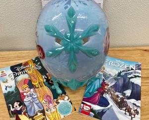 lot 49 image: Disney Frozen Youth Bike Helmet and Comic Books Lot