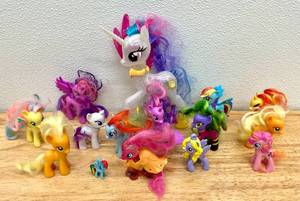 lot 55 image: Lot of My Little Pony Toy Figures and Storybook
