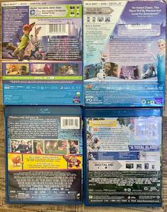 lot 65 image: Lot of 4 Disney Blu Ray Movies Frozen Zootopia Pixels and Rio 2