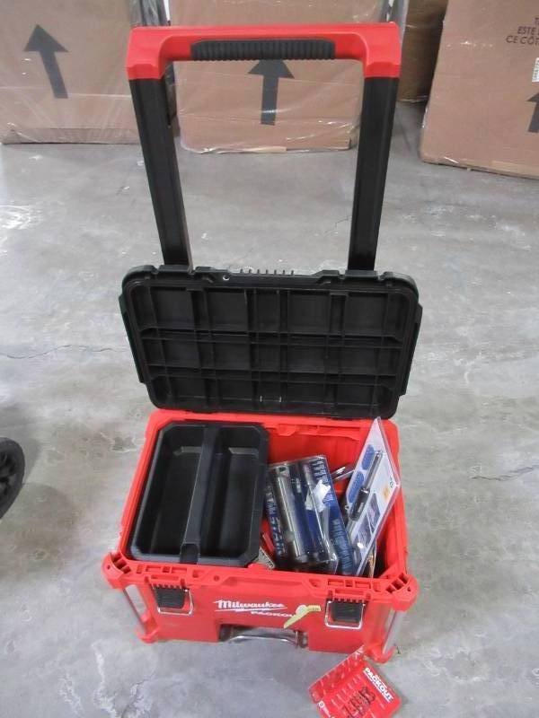 lot 163 image: Milwaukee PACKOUT 22 in. Rolling Tool Box, Filled With Power Tools, New Handtools and More