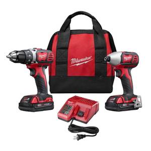 lot 31 image: Milwaukee M18 18-Volt Lithium-Ion Cordless Drill DriverImpact Driver Combo Kit (2-Tool), 2691-22 - Works - Drill Sparks (needs repair).