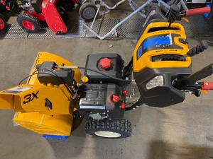 lot 53 image: Cub Cadet 3X 26 in. 357 cc Three-Stage Gas Snow Blower with Electric Start and Steel Chute, Power Steering and Heated Grips in working condition see pics carefully 