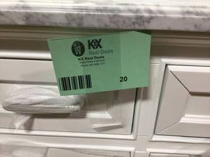 lot 20 image: Pallet of Windlowe 61 in. W x 22 in. D x 35 in. H Bath Vanity in White with Carrera Marble Vanity Top in White with White Sink by Home Decorators Collection Cuatomer Returns See Pictures