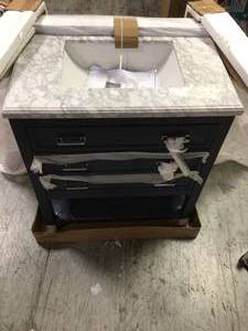 lot 26 image: Pallet of Everett 31 in. W x 22 in. D Vanity Cabinet in Aegean Blue with Carrara Marble Vanity Top in White with White Basin by Home Decorators Collection Customer Returns See Pictures