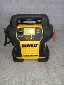lot 44 image: 1600 Peak Amp Portable Car Jump Starter with 120 PSI Digital Air Compressor and 500-Watt Inverter by Dewalt- slightly used -SEE PICTURES