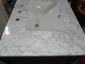 lot 86 image: Merryfield 31 in. W x 22 in. D Bath Vanity in Dark Blue-Gray with Marble Vanity Top in Carrara White with White Basin by Home Decorators Collection- damaged -SEE PICTURES