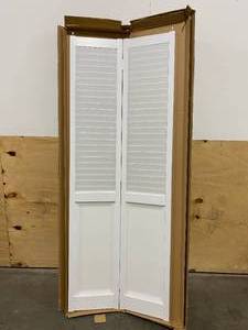 lot 73 image: PINECROFT 30 in. x 80 in. Seabrooke Louver Over Panel White Hollow Core PVC Vinyl Interior Bi-Fold Door