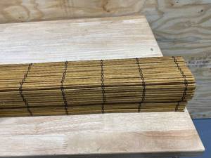 lot 82 image: CHICOLOGY Premium True-to-Size Brown Fox Cordless Light Filtering Natural Woven Bamboo Roman Shade 36 in. W x 64 in. L