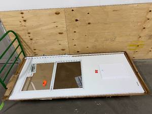 lot 85 image: EMCO 36 in. x 80 in. K900 Series White Vinyl Self-Storing Pet Storm Door with Black Hardware