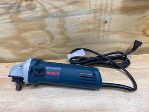 lot 103 image: BOSCH 6 Amp Corded 4-12 in. Small Angle Grinder