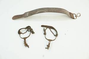 lot 19 image: leather straight edge, vintage spurs