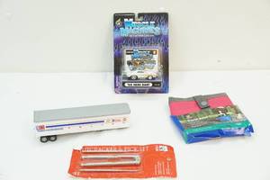 lot 220 image: Die cast car, travel dog bowl, semi, nutcracker set