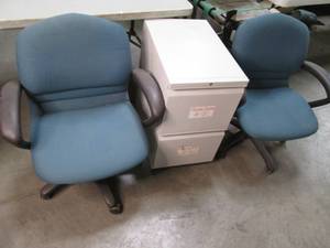 2 office chairs and a filing cabine...