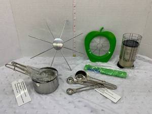 lot 72 image: MIsc Kitchen - Pie Slicer, Measuring and Apple Slice Peeler