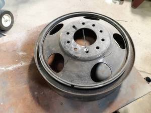 lot 200 image: New Old Stock Rim, believed to be from a early 50s 1 ton truck