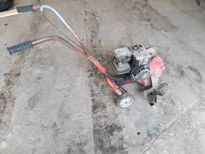 lot 109 image: Garden Tiller - Motor pulls over