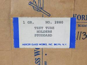 lot 150 image: Case of Mercer Glass Works Elemental Test Tube Clamps