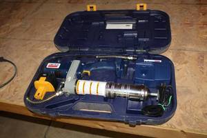 lot 23 image: Lincoln Powerluber Power Grease Gun with Case 1200