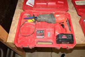 lot 31 image: Milwaukee 18V Cordless Heavy Duty Sawzall The Hatchet with Battery, Heavy Duty Charger, Case 6514-20
