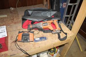 lot 36 image: Ridgid 18V Cordless Sawzall with Battery, Charger, Tool Bag