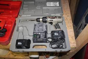 lot 53 image: Porter-Cable 14.4V Cordless HammerdrillDriver 12 with Batteries (x2), Charger, Case 877