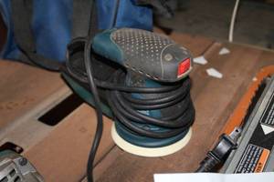 lot 57 image: Bosch Palm Sander with Case