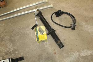 lot 101 image: Lot of (3) Trailer Accessories - Trailer Crank, Electric Brake Controller, Trailer Adapter Cable