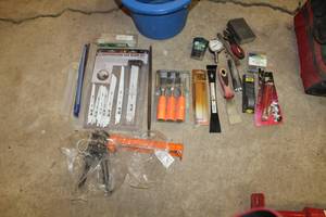 lot 94 image: Hand Tools - Chisels, Rasp, Replacement Blades, Caulk Gun, Pressure Gauge, Pry Bar, Reciprocating Saw Blade Kit, Misc. Hand Tools (in bucket)
