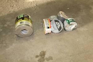 lot 126 image: Lot of (8) Rolls of Duct Tape - Grey (x7), White Hurricane (x1) (new)