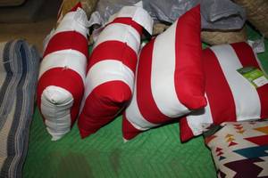 lot 143 image: Lot of (4) Mainstays IndoorOutdoor Toss Pillow RedWhite Stripe 16Wx16H