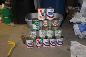 lot 174 image: Lot of (14) Vintage Motor Oil 1 Qt. Can - Valvoline, Havoline, Quaker State, Phillips 66 (unopened)