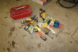 lot 261 image: Plastic Tool Caddy, Hand Tools - Gloves, Ear Plug Protection, Ear Noise Cancel Headphones, Hand Auger, Pruners, Box Cutter, Tape Measure, Scissors, Wire Brush Scraper, Misc. Hand Tools