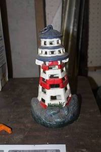 lot 387 image: Cast Iron Lighthouse Candleholder 10H