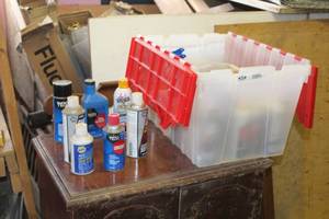 lot 296 image: Lot of Automotive Chemicals - Starter Fluid, Lubricant, Carb Choke, Carb Cleaner, Oil Treatment, White Lithium Grease, Misc. Chemicals (in plastic bin)