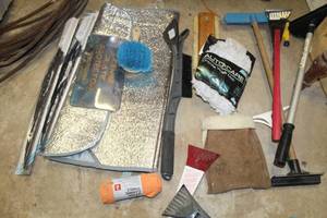 lot 290 image: Lot of (Approximately 15) Automotive Accessories - Scrapers, Washing Mitts, Windshield Wiper Blades, Sunscreen, Cleaning Towels
