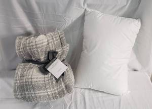 1 (new with tags) gray plaid throw with sherpa lining & 1 new travel pillow