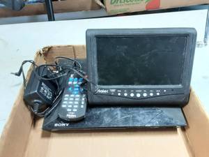 lot 30 image: Haier Portable TV With Charger & Remote, Sony Blu-Ray Player (No Power Cord)