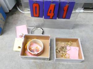 Box of costume jewelry. As shown.