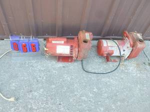 Qty of 2 cast iron red lion pumps. Have been sitting for a while. Motors buzz when plugged in. As shown.