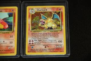 lot 11 image: 1999 Pokemon Base Set Charizard Evolution Set