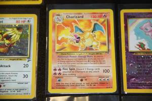 lot 59 image: 1999 to 2006 Extreme Low Grade Pokemon Card Lot  Charizard  450 Cards