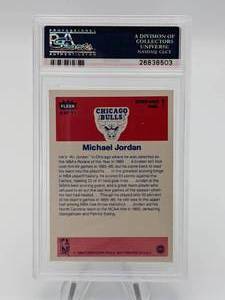 lot 2 image: 1986 Fleer Michael Jordan #8 Sticker Rookie Card PSA 7