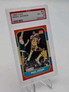 lot 39 image: 1986 Fleer Magic Johnson #53 Basketball Card PSA 8