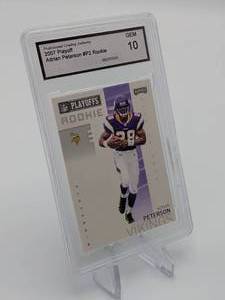lot 45 image: 2007 Donruss Playoff Adrian Peterson Rookie Card #P2 PGA 10 (GEM MINT)